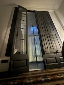 Gorgeous very tall doors in the main sleeping area