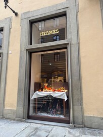 Next to luxury stores