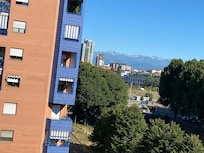 Vista dos Alpes, da janela do apartamento