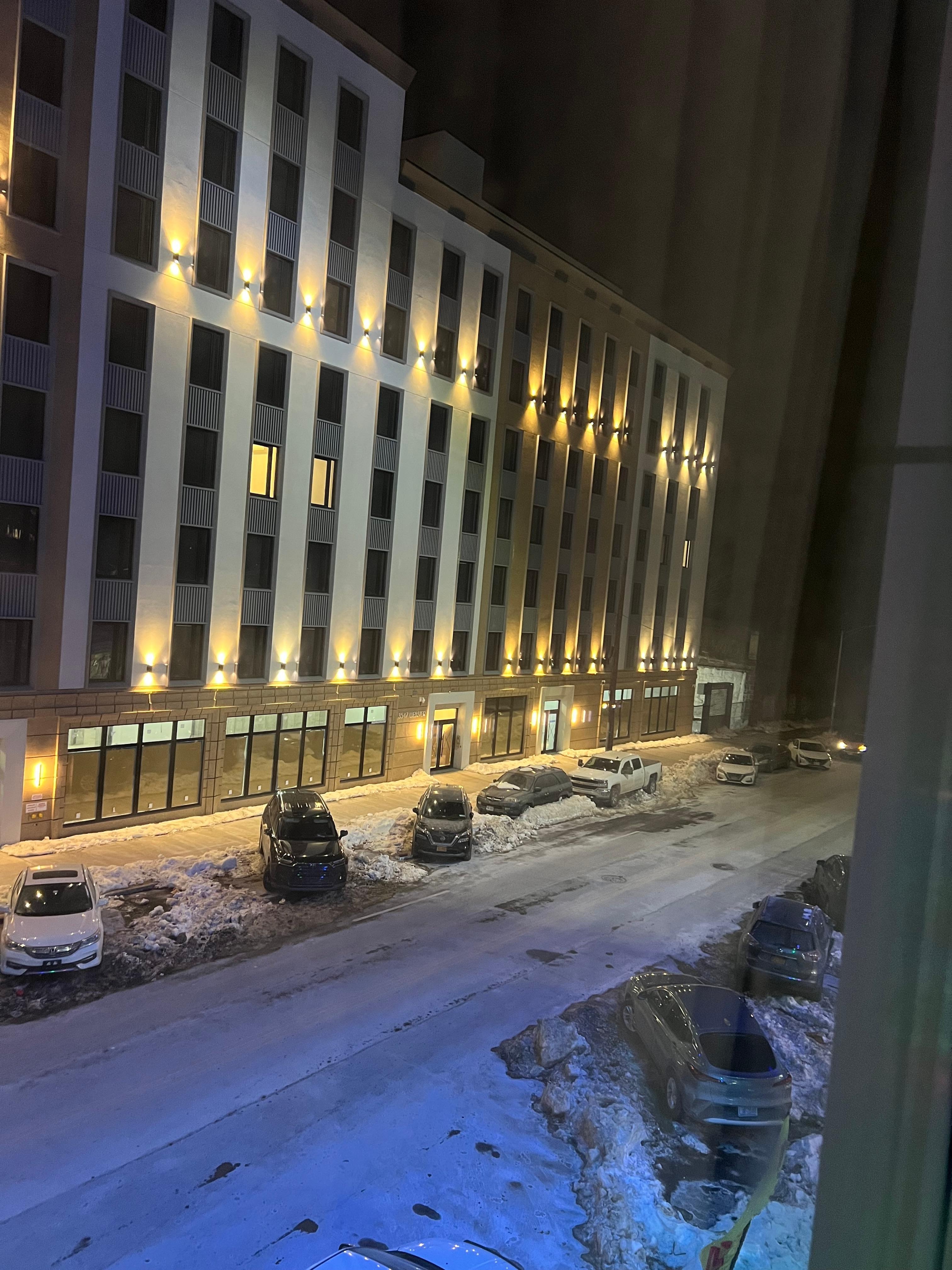 View from the room view of area from my room and street parking 