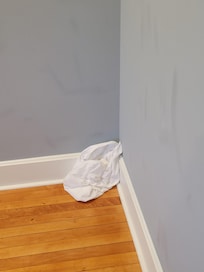 Dirty pillow case in corner