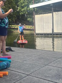 Learning how to stay on a paddle board