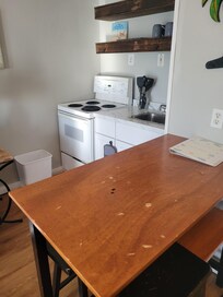 The table had many burns and bumps.