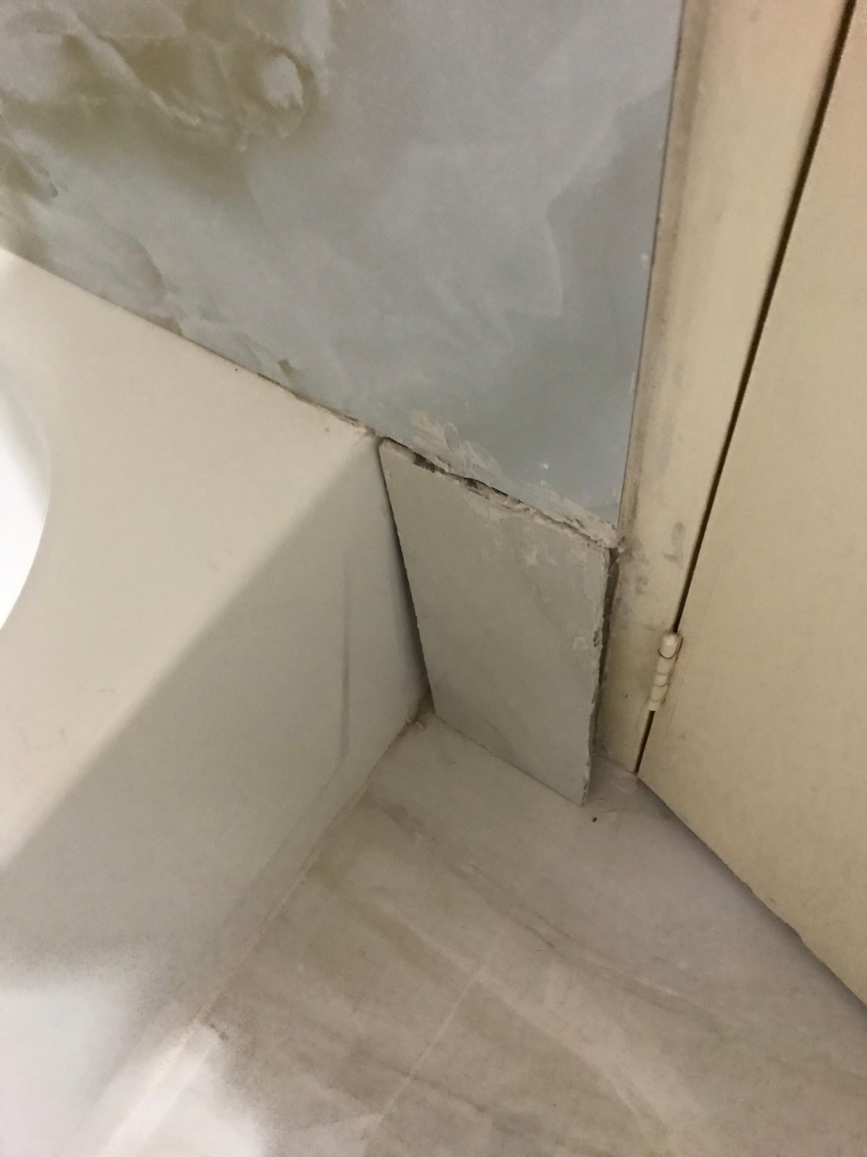 bath tub tile broken and falling off