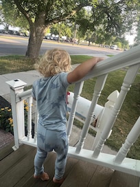 Grandson on front porch