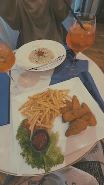 Appetizers on the menu. So we shared the chicken nuggets and fries and gnocchi with basil.