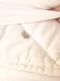 Blood stain on bed linen