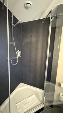 Water pressure was good nice hot water comfortable size shower what more could you want?