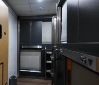 The pods with their paper curtains. The side panels look like they slide closed but they do not. They are bolted open.