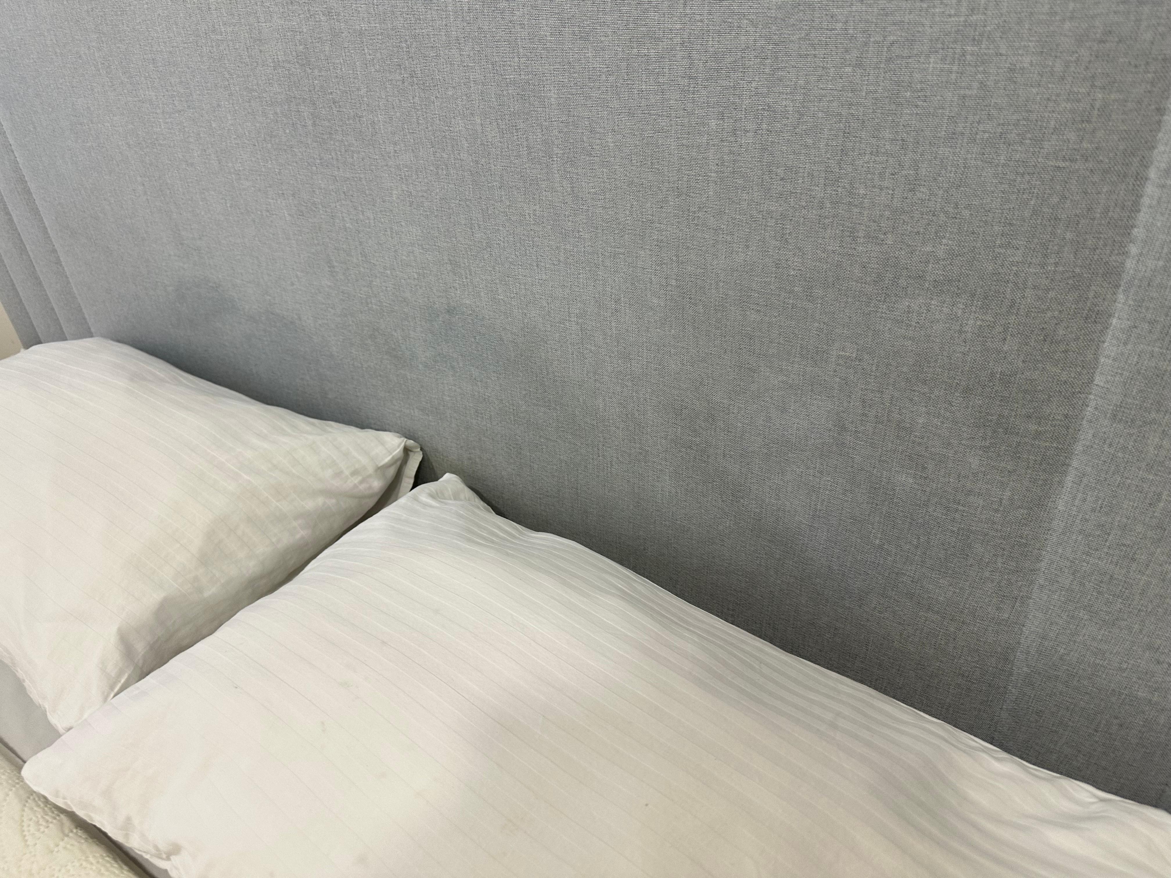 Both back boards have these stains. Sheets, bedding dingy.