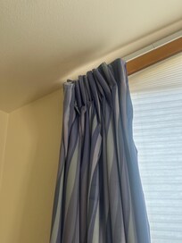 Curtains not all attached to the rod