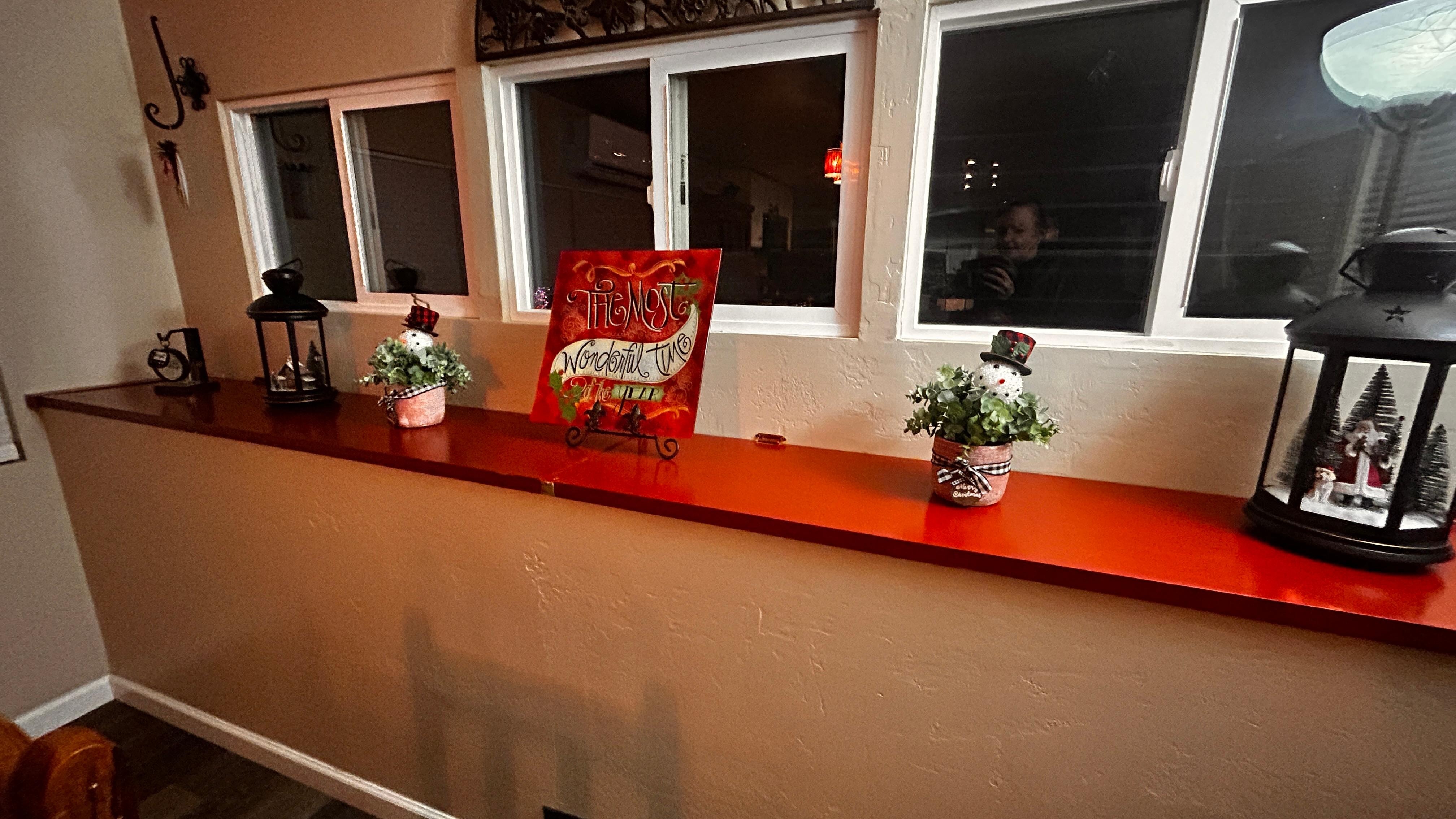 Dining room area shelf with adorable Christmas decor