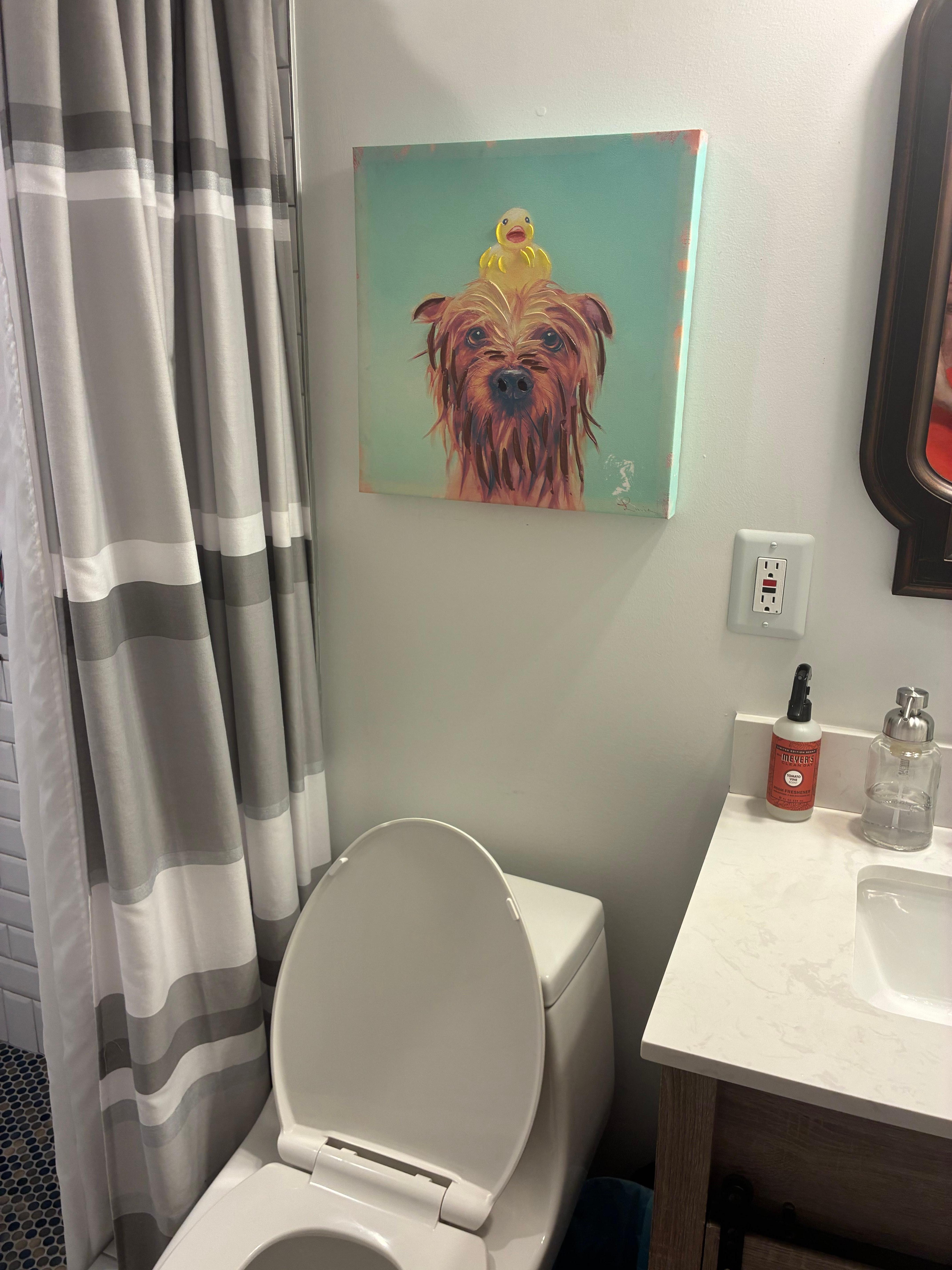 Picture in the bathroom looks just like my sweet Cho Cho. Definitely a good rental for dog lovers.