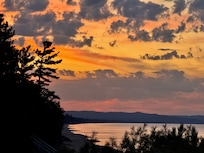 The sunset on our first night, taken from inside the house looking out at Marquette.