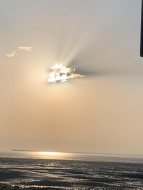Sunset on the beach across the road.