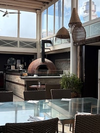 Dining area where pizza is made