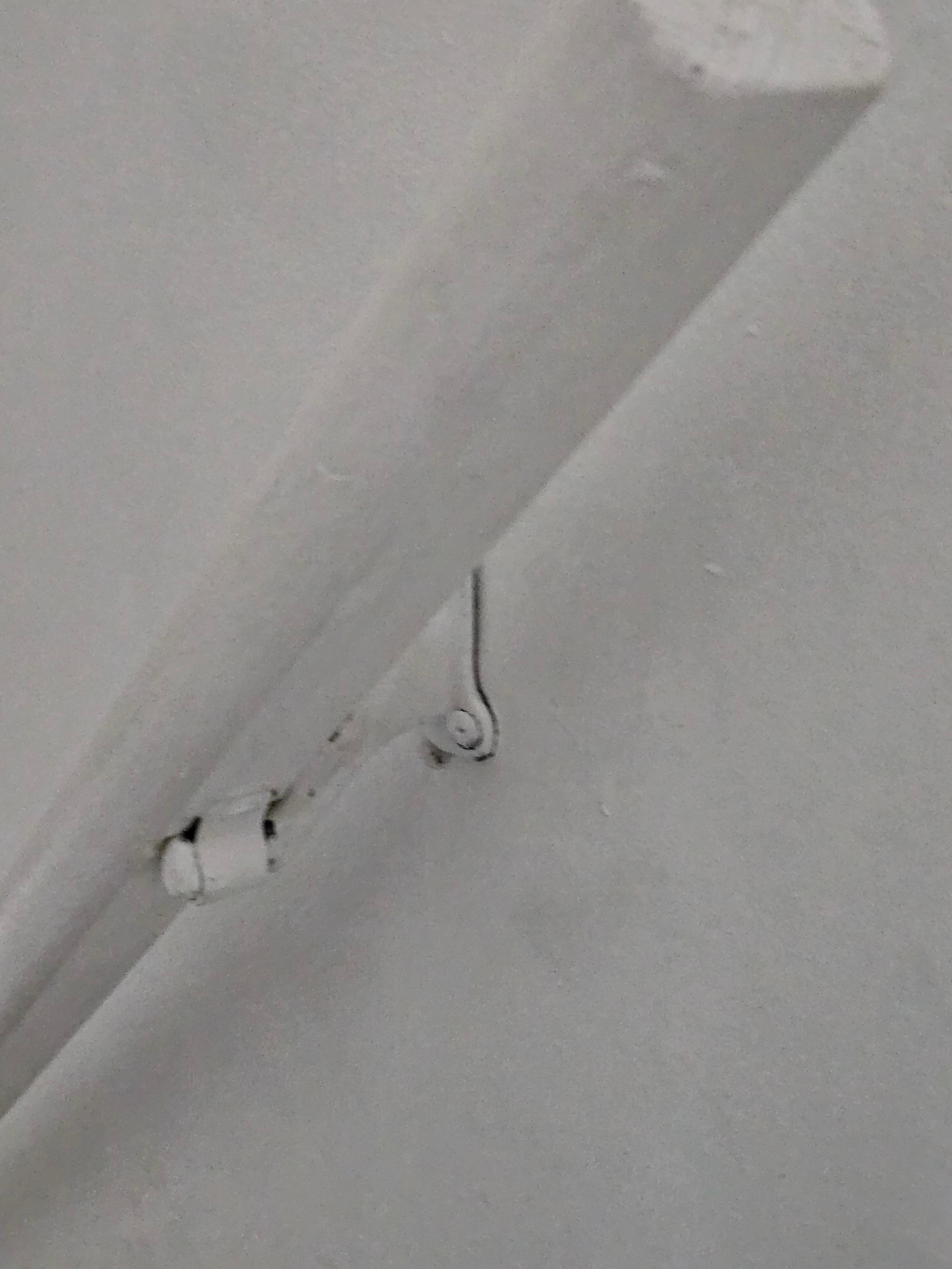 Banister is installed upside-down and is not attached firmly to wall. 