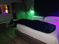 Bedroom that is completely closed in from the rest of the room