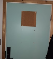 This is where the mandatory emergency exit information should be located.