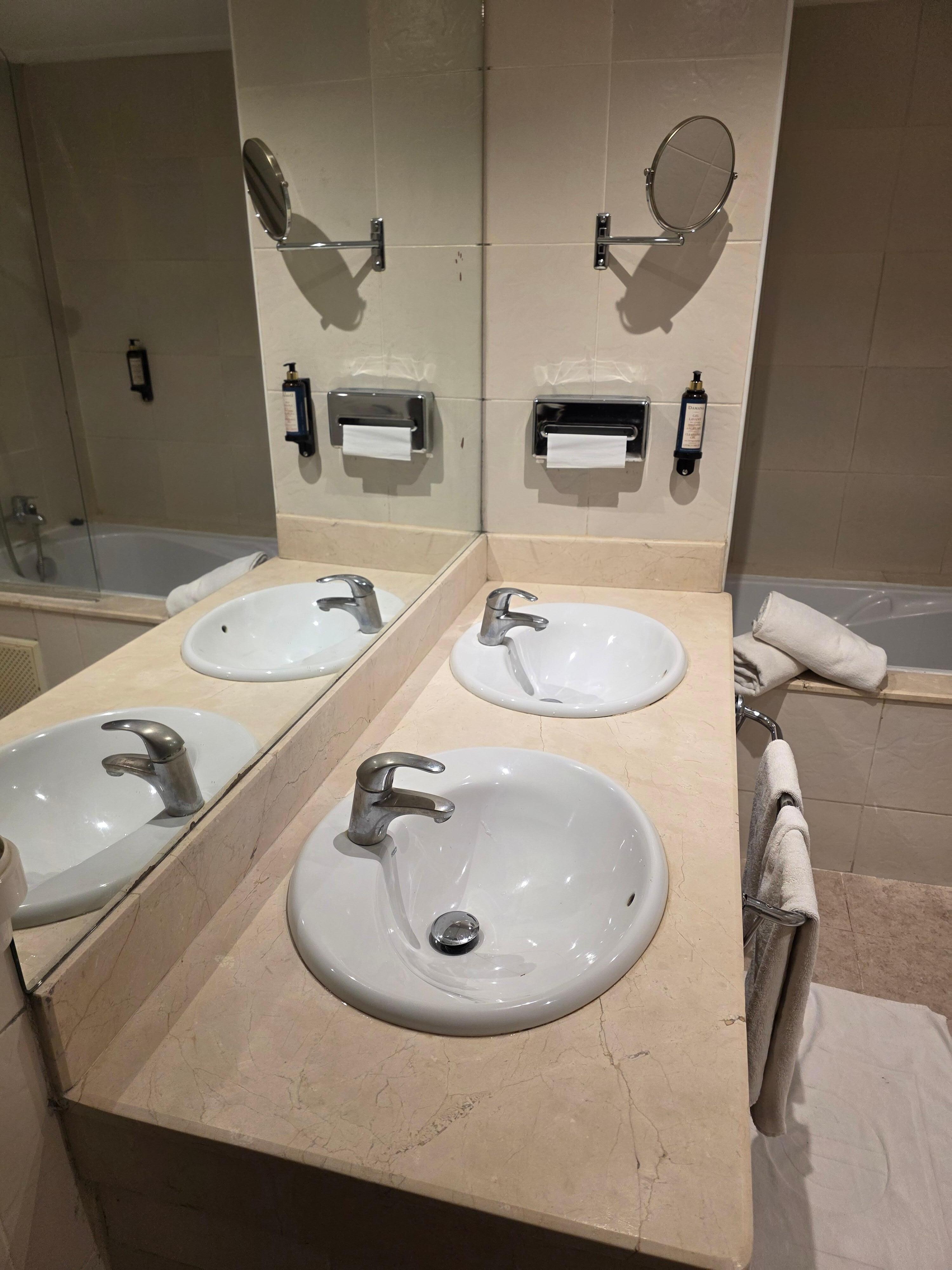 This is the bathroom, it's bare. People have a toothbrush, toothpaste, razor, plus even the smallest hotel offers shampoo or/and gel. Here they don't.