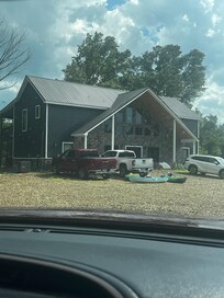 Front of cabin. Very adequate parking. We had 5 vehicles.
