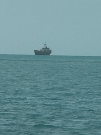 Abandoned ship off the shore in your backyard.