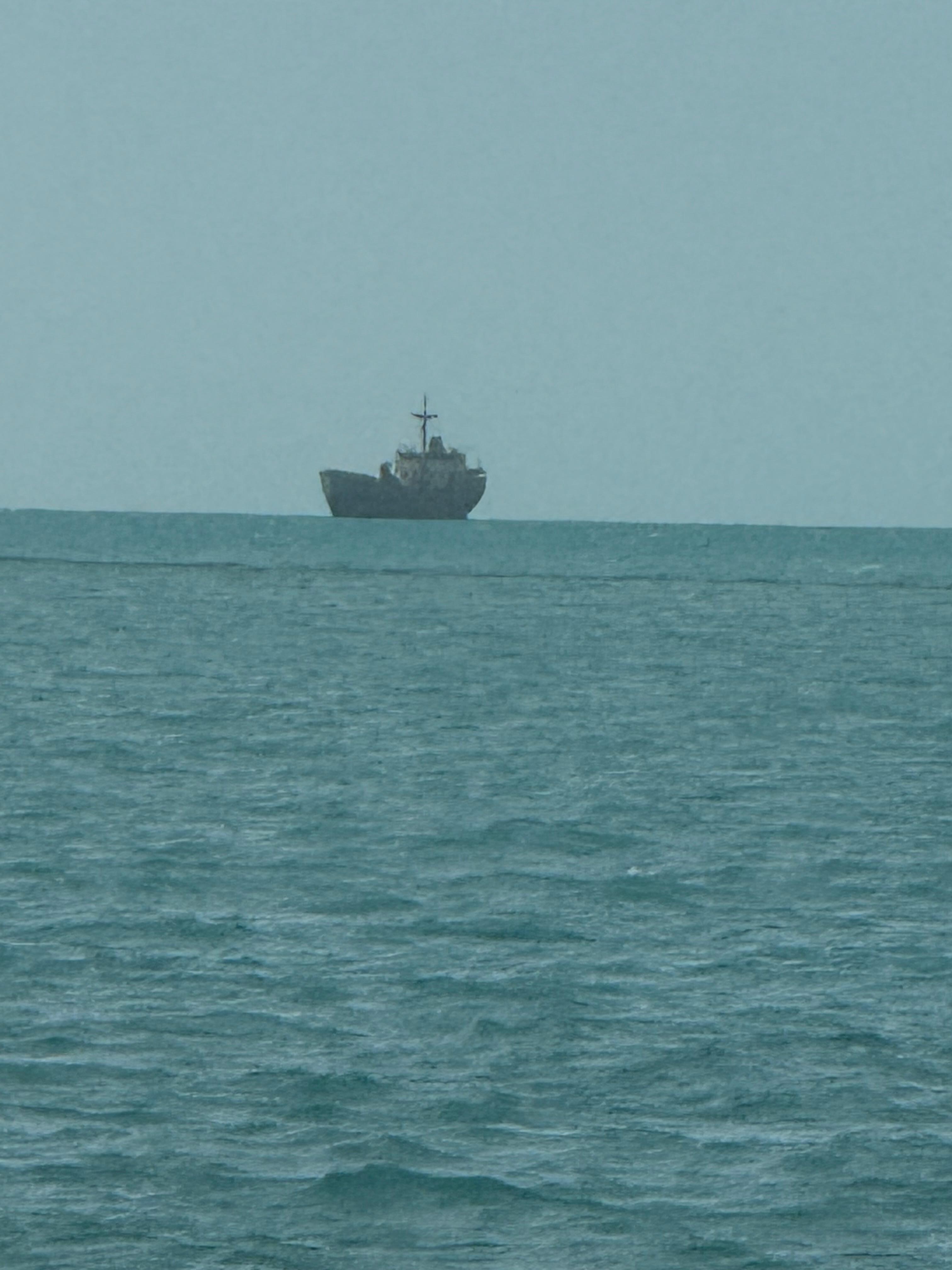 Abandoned ship off the shore in your backyard. 