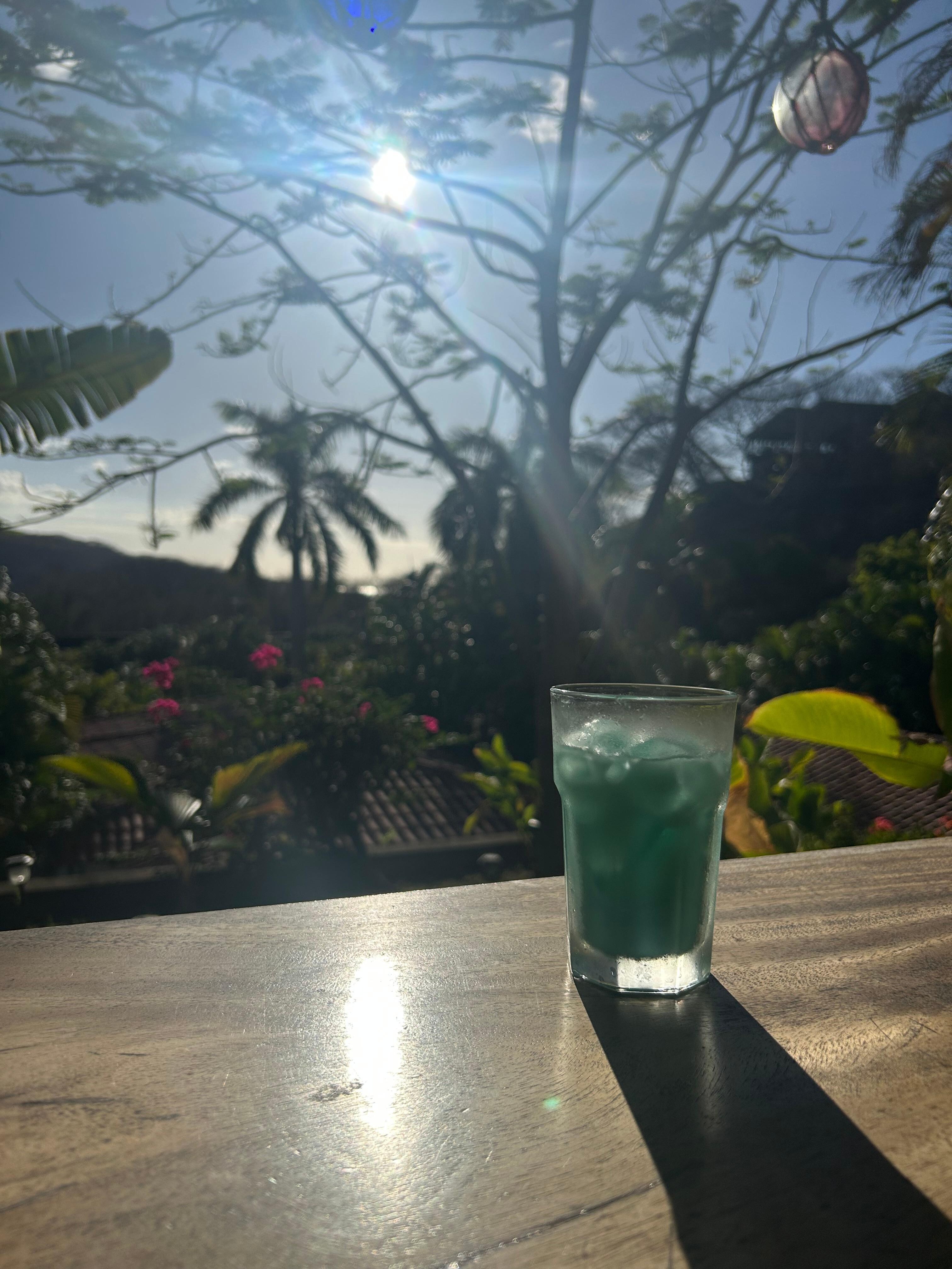 Sitting on our patio, I was obsessed with the blue Hawaiians 🤤