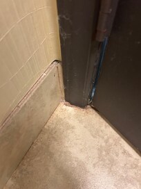 Grungy, rusty moldy grout/floor/mold/tile