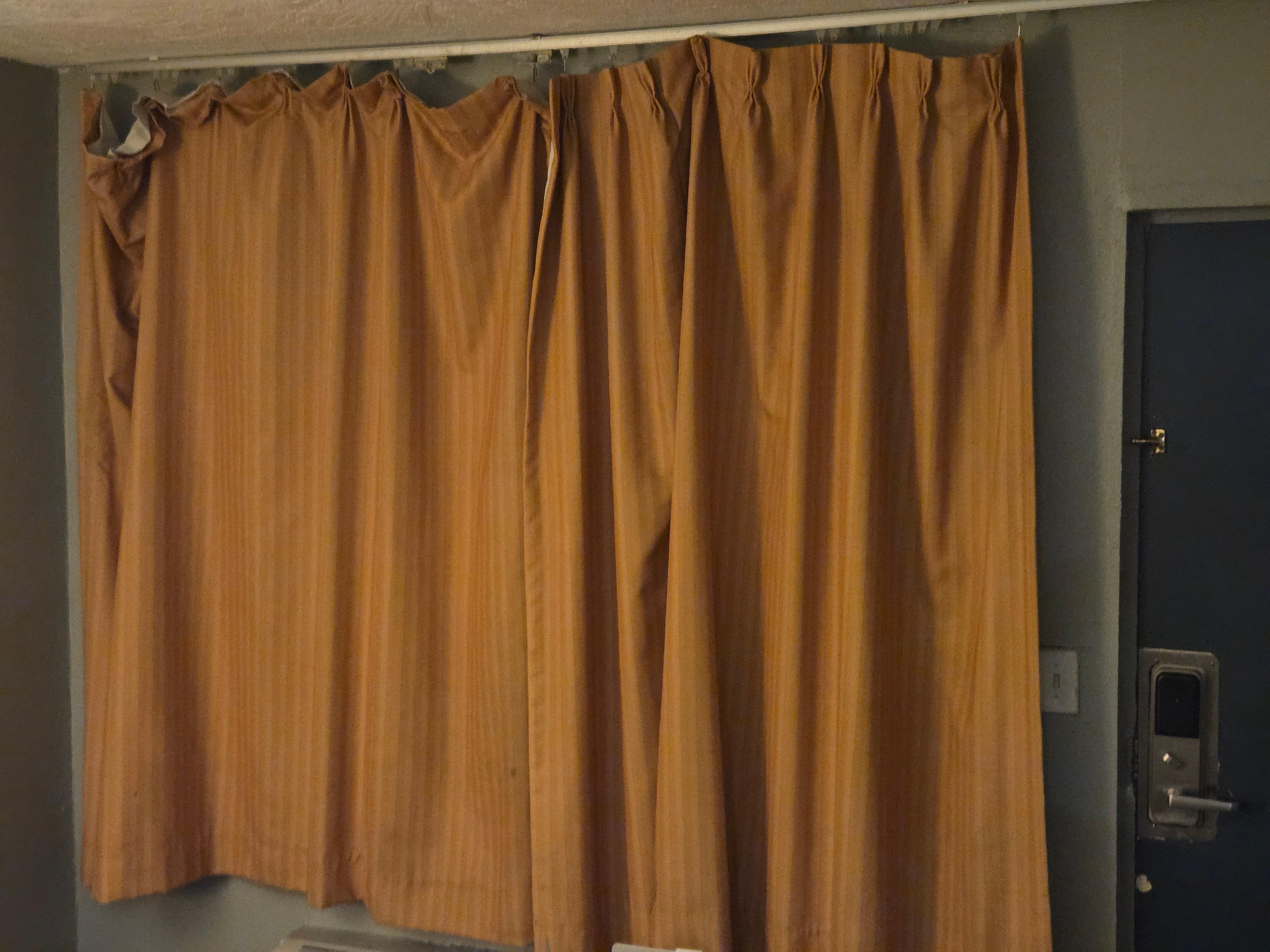 Thin and barely hanging