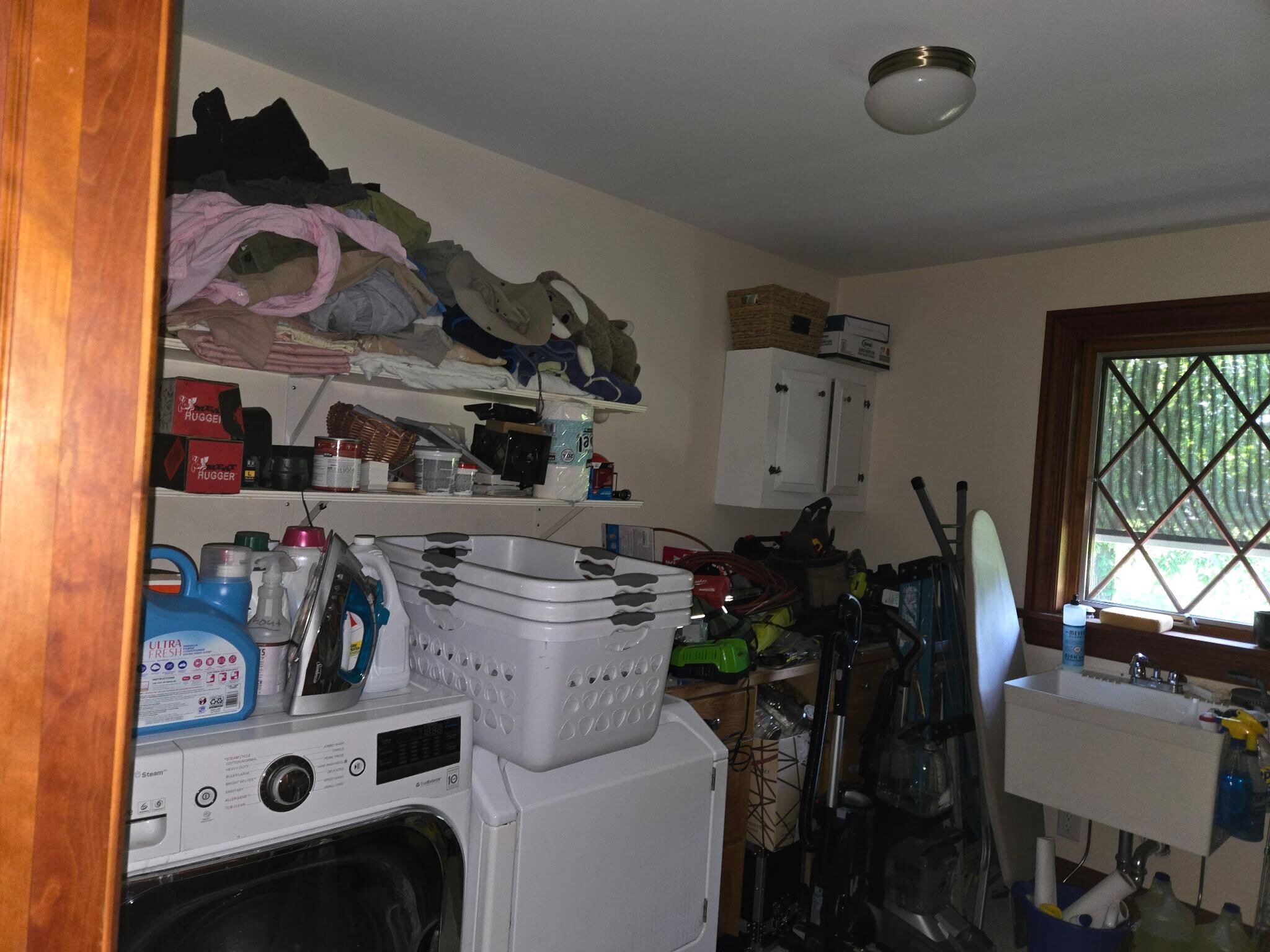 Cluttered laundry room
