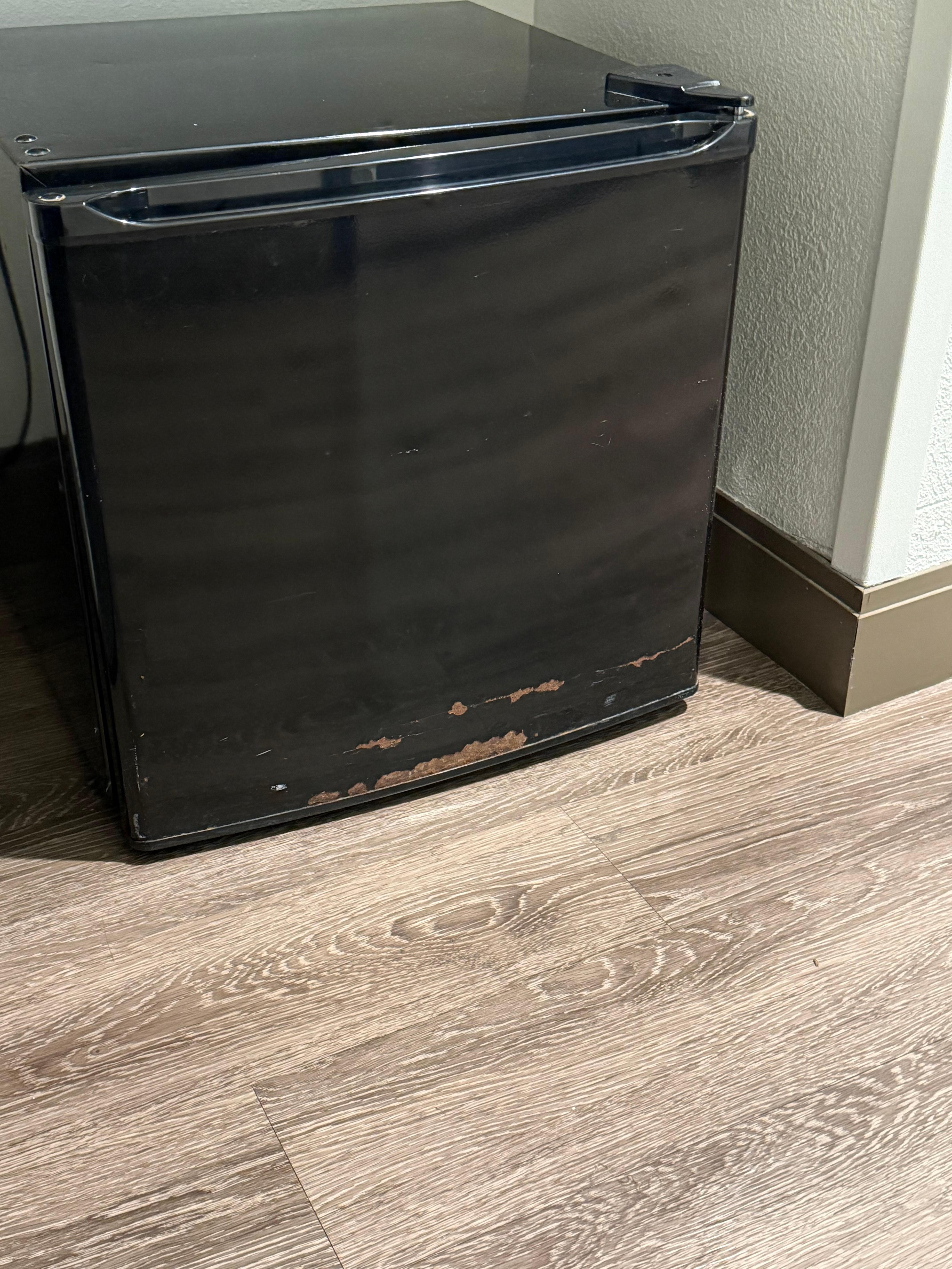 Rusty old fridge. It stank inside it too.