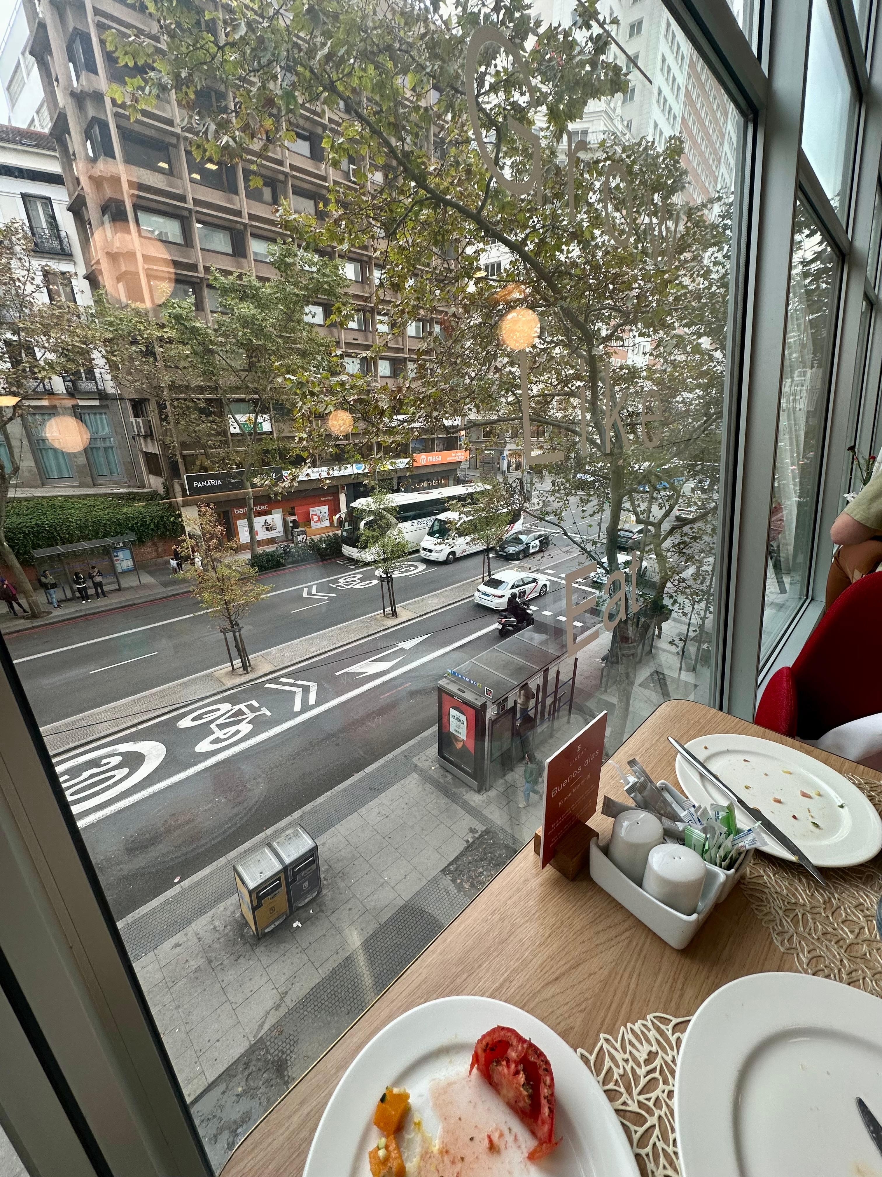 Looking out the window eating breakfast