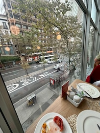 Looking out the window eating breakfast