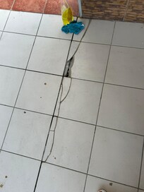 Broken cracked floor tiles