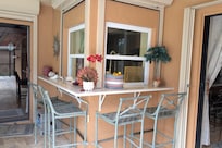 What a great way to pass snacks from the kitchen to the lanai!