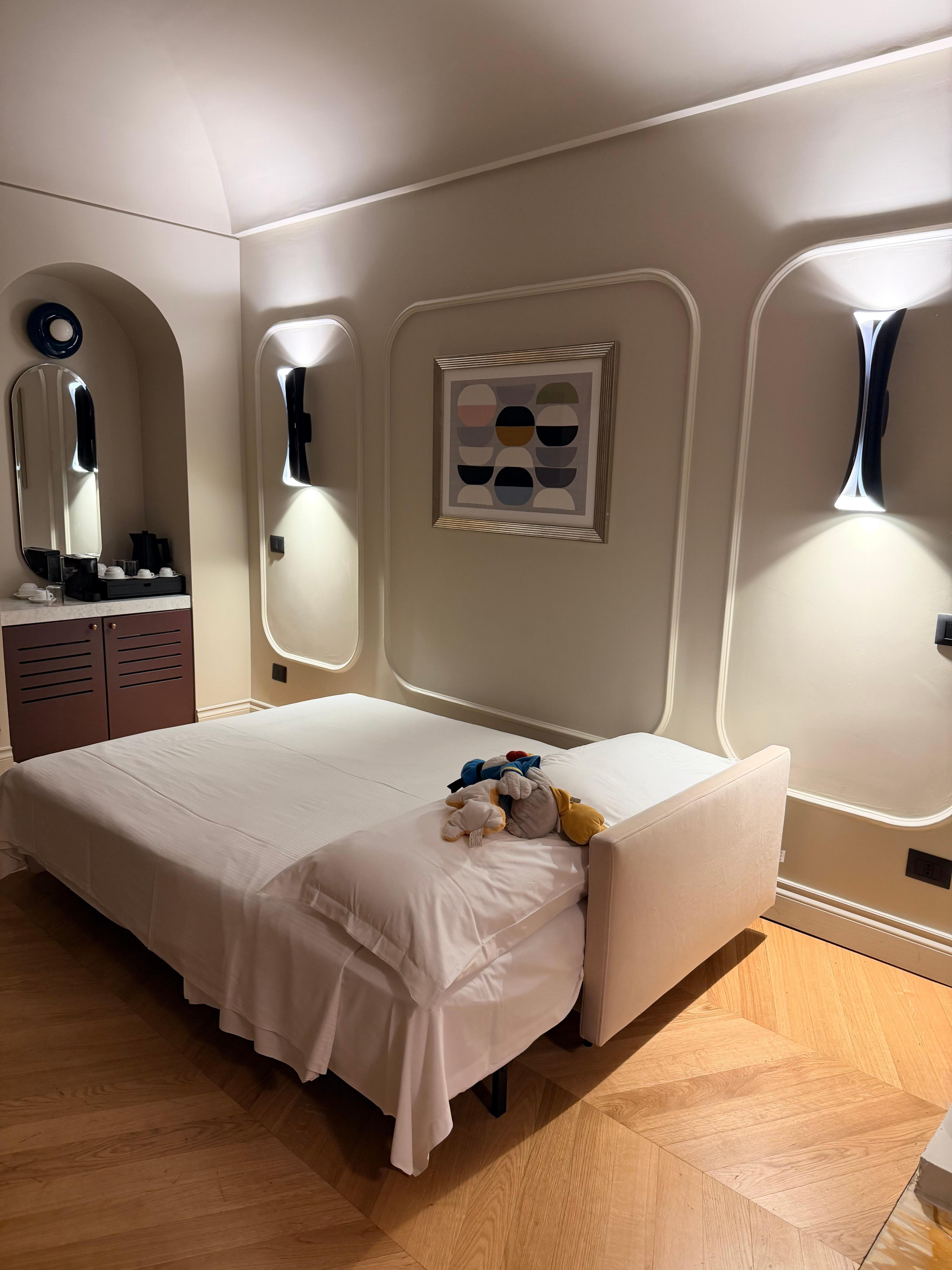 We stay at the junior suite. And the sofa bad is for our two young kids.