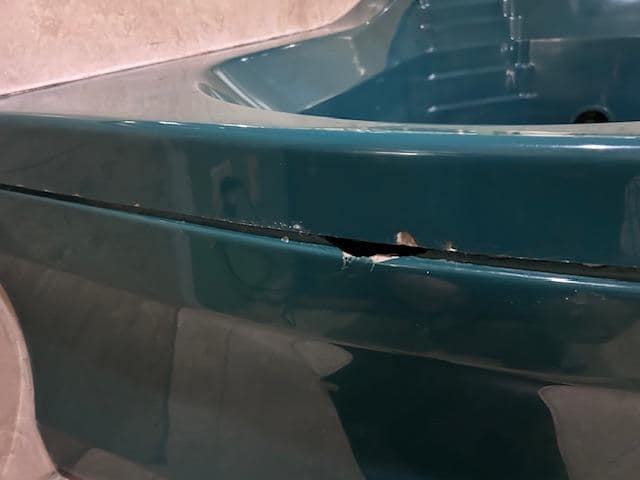 Hole in the front of tub