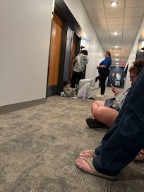 Waiting for the door to be opened for us.