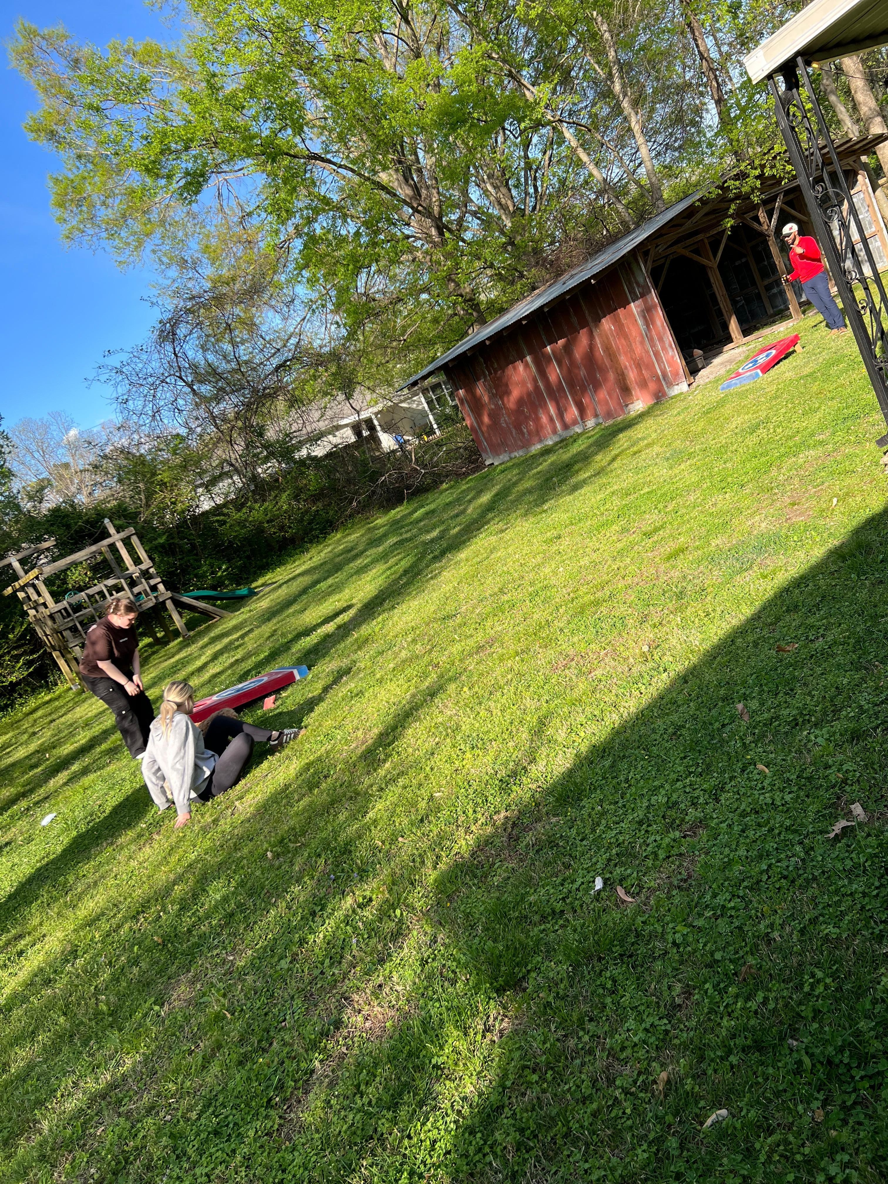 Corn hole game in the back yard
