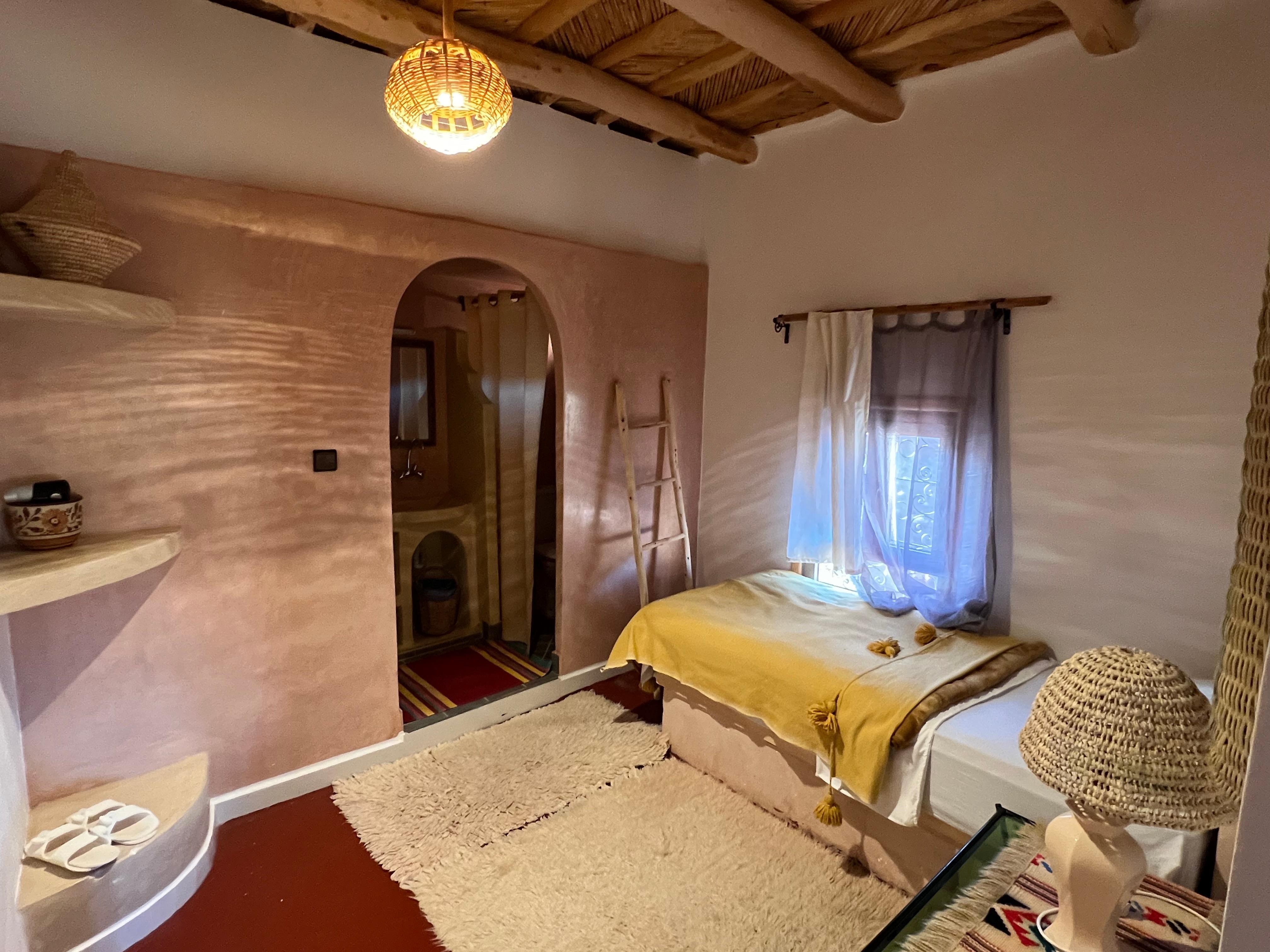 Separate room- connected- by wall- one twin bed 