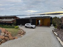 Front of house with ample parking