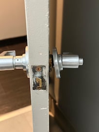 Loose door hardware