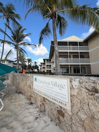 Screened Porch on second floor - just steps from beach, and provides wonderful sunset views.