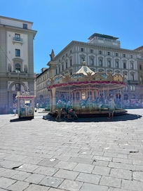 Steps from a main square with historic cafes, shops, etc