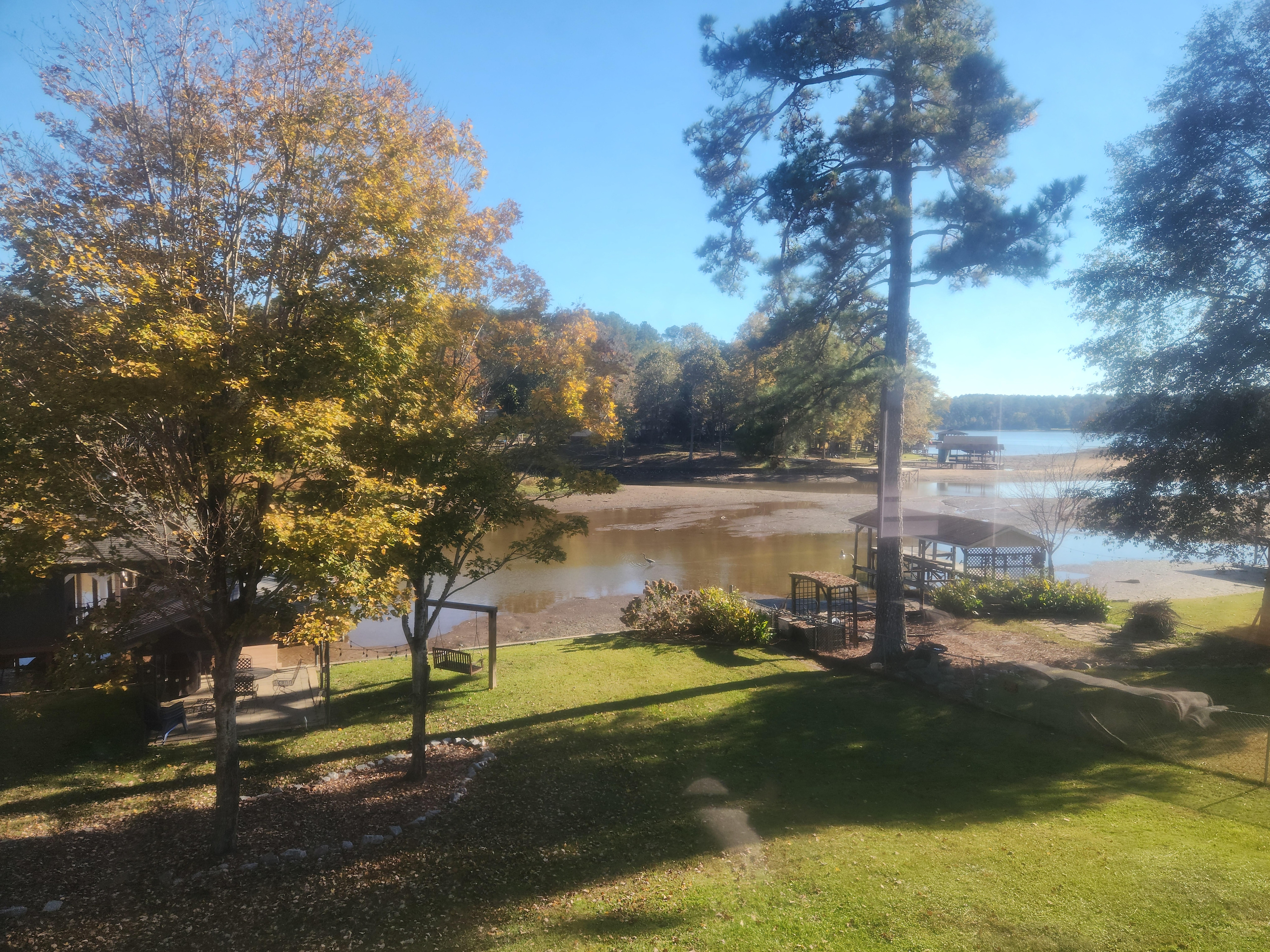 Stunning views from the living room, even with Lake Sinclair's 5-year regular draw-dawn by Georgia Power for lake residents to build and repair seawalls and docks.