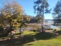 Stunning views from the living room, even with Lake Sinclair's 5-year regular draw-dawn by Georgia Power for lake residents to build and repair seawalls and docks.