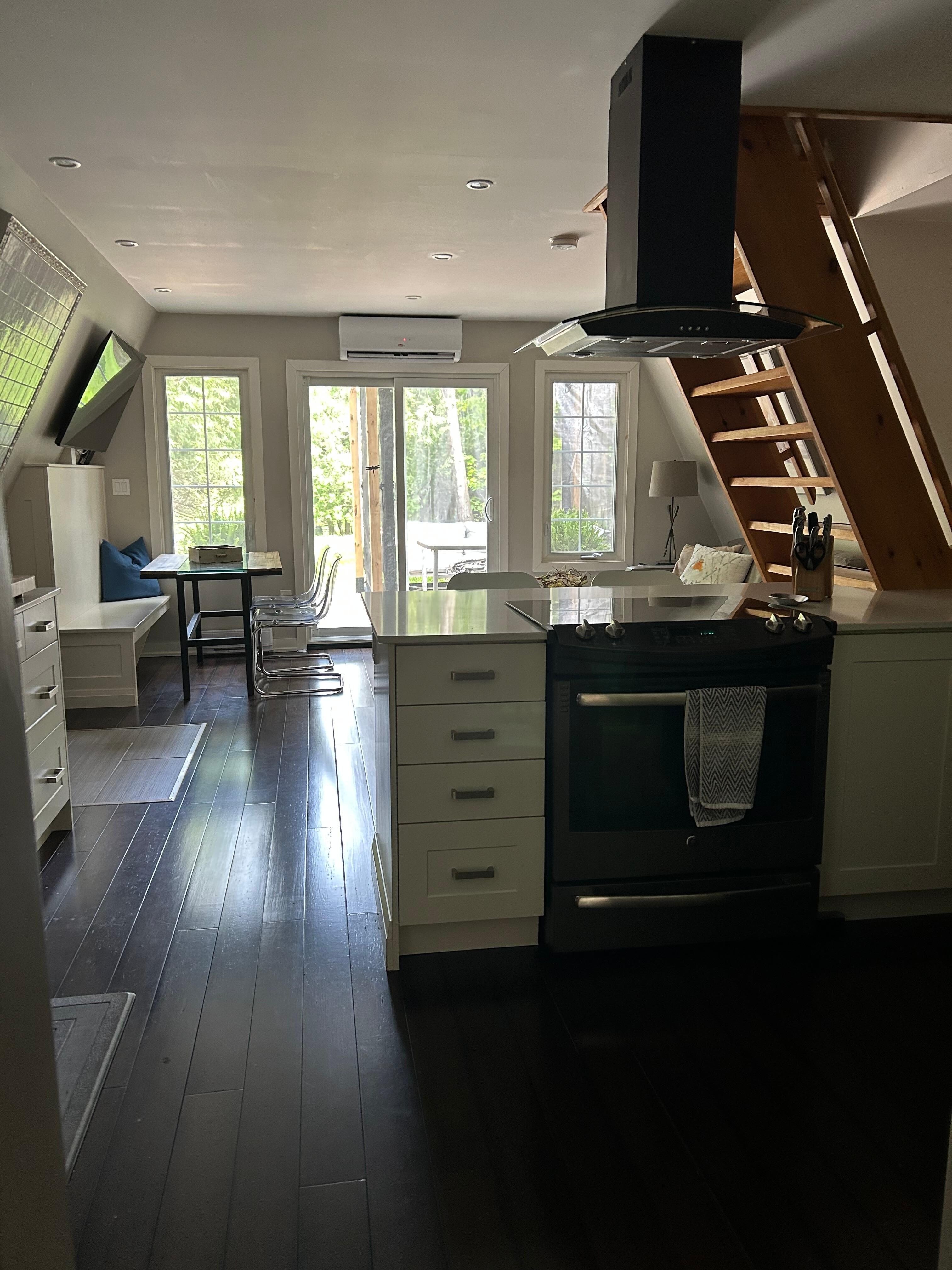 Interior looking from front door towards back deck