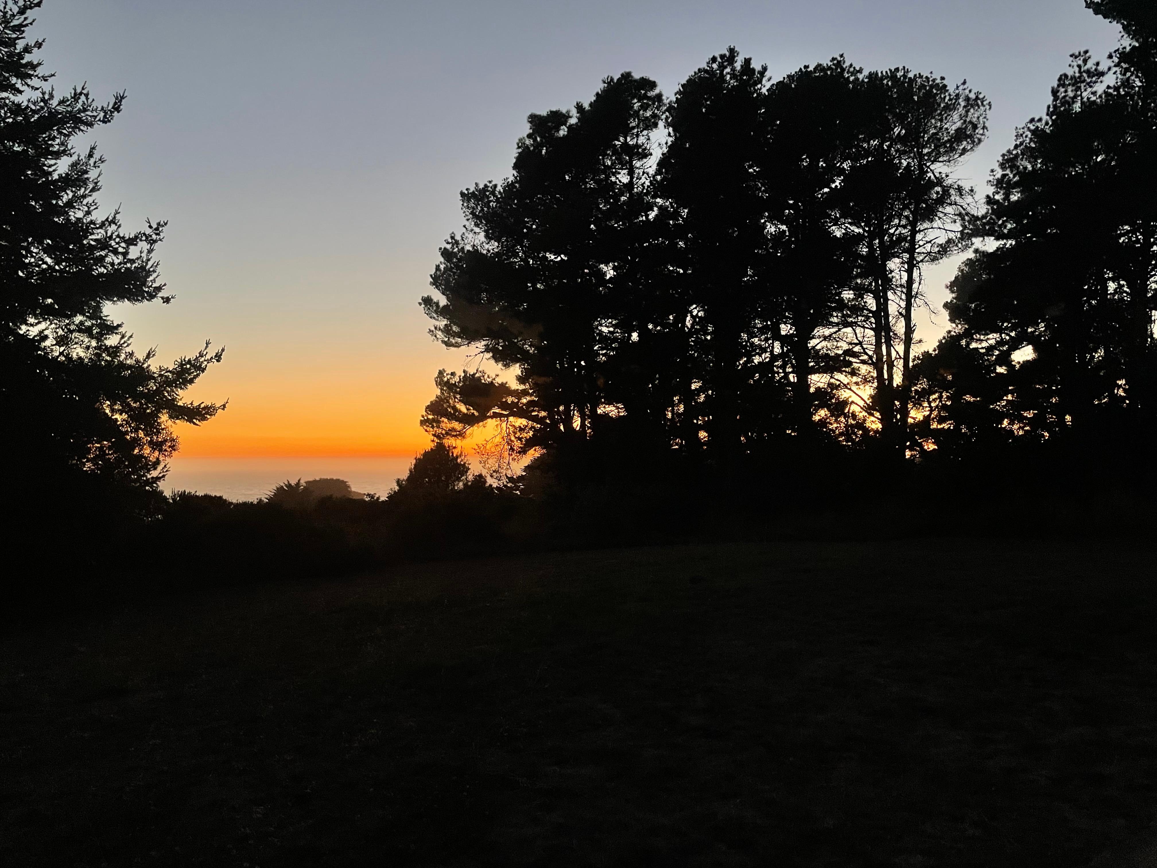 Late sunset over the ocean prior to the starry night. 