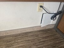 Very dirty carpet floors and walls